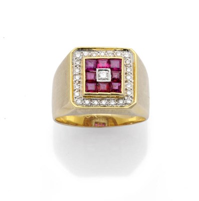 Lot 627 - A Gentleman's Diamond and Ruby Ring, a central round brilliant cut diamond is bordered by a row...