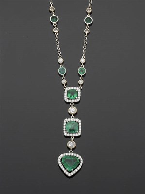 Lot 639 - An Emerald and Diamond Necklace, two graduated clusters of step cut emeralds within borders of...