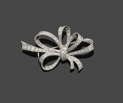 Lot 642 - A Diamond Bow Brooch, the eight-cut and baguette cut diamonds arranged in claw settings, total...