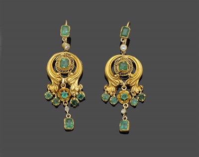 Lot 650 - A Pair of Emerald and Diamond Drop Earrings, the round and step cut emeralds arranged in...