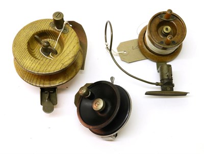 Lot 3121 - Three Reels, comprising a spring loaded 4"; Nottingham pin reel, a similar chrome and bakelite reel