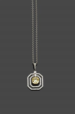 Lot 655 - A Fancy Yellow and White Diamond Pendant on Chain, the fancy yellow square modified brilliant...