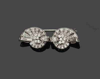 Lot 657 - A Diamond Double Clip Brooch, circa 1930, the eight-cut and baguette cut diamonds arranged in...