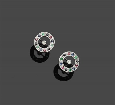 Lot 666 - A Pair of Ruby, Emerald, Sapphire and Diamond Circular Stud Earrings, a round brilliant cut diamond