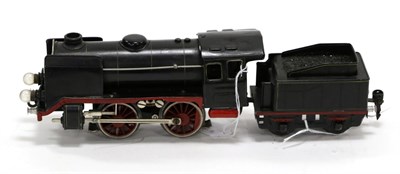 Lot 3324 - Marklin O Gauge 20-Volt Electric 0-4-0 R66/12910 Locomotive and four wheel tender, black (G,...