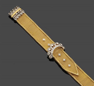 Lot 688 - A Diamond Bracelet, the broad yellow bracelet of mesh links, with a foxtail link border, formed...