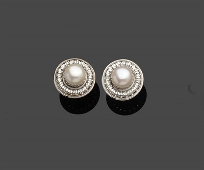 Lot 690 - A Pair of 18 Carat White Gold Cultured Pearl and Diamond Cluster Stud Earrings, the large...