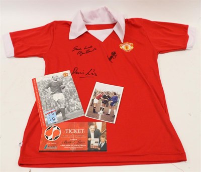 Lot 3037 - Manchester United Signed Retro Shirt signed by Bobby Charlton, George Best and Denis Law; with...