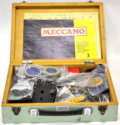 Lot 3315 - Meccano A Small Collection Of Loose Parts blue/yellow, with instruction booklets for Set 2 and...