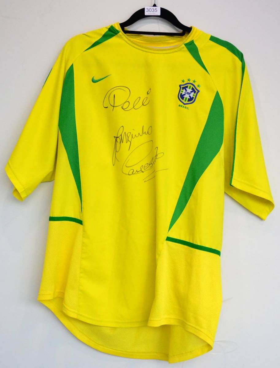 Lot 3035 - Pele, Jairzinho and Carlos Alberto Signed Brazil Shirt 2002; with Prestige Certificate of...