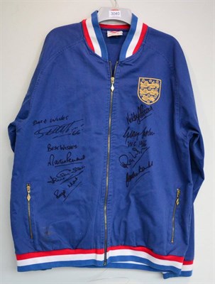 Lot 3040 - World Cup 1966 England Signed Retro Jacket blue with three lions badge, signed by 8 team...