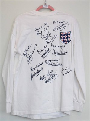Lot 3043 - World Cup 1966 England Signed Retro Shirt white with three lions badge, signed by 10 team...