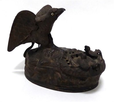 Lot 3148 - Cast Iron Money Bank with a bird delivering the coin to two chicks in the nest; marked to base 'Pat