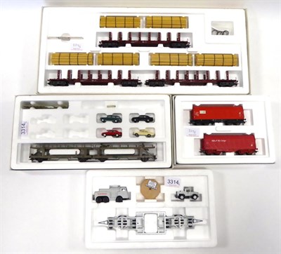 Lot 3314 - Marklin HO Wagon Sets 4516 Wood transport, 47121 Double auto transport car, 46824 Paper Glazing...