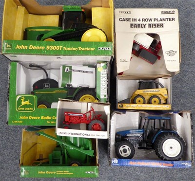 Lot 3397 - Ertl Tractors Case 1H STX 375, Case 1H STX 275, John Deere Radio Controlled 8310, New Holland...