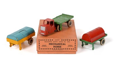 Lot 3417 - Dinky (Pre-War) Mechanical Horse And Trailers consisting of 33A Mechanical Horse, red (G) 33b...