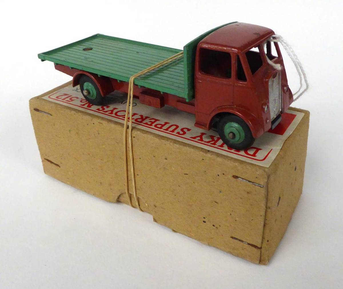 Lot 3422 - Dinky 512 Guy Flat Truck brown/green (G-E, some chips to cab, in plain card box G-E)