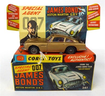 Lot 3446 - Corgi 261 James Bond Aston Martin DB5 in display box (G-E, with instructions and spare man, box E)