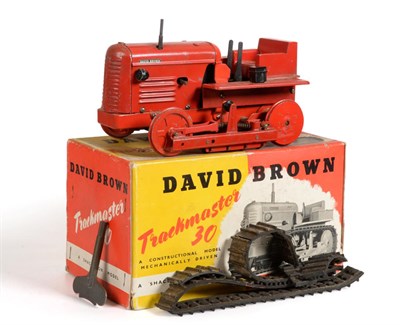 Lot 3468 - Shackleton David Brown Trackmaster 30 Caterpillar Tractor red with clockwork mechanism (G, some...