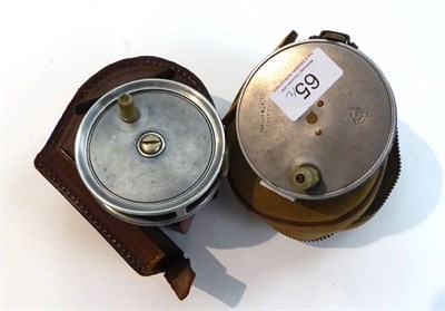 Lot 65 - A Farlows 3 1/2inch Alloy Fly Reel, with Holdfast trademark, white handle, strapped tension...