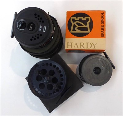 Lot 113 - Three Fishing Reels, comprising a Hardy 3 3/4inch alloy 'Uniqua' reel with spare spool, a boxed...