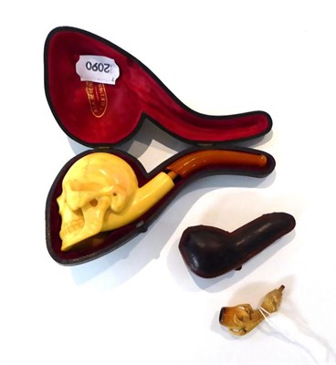 Lot 171 - A Meerschaum Pipe Bowl Carved as a Human Skull, with damaged mouthpiece, in velvet lined case,...