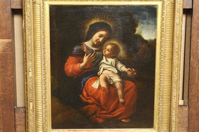 Lot 851 - Italian School (18th century) Virgin and Child seated in a Landscape Oil on canvas, laid down, 39cm