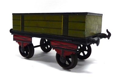 Lot 449 - Bing Gauge III Three Plank Open Wagon painted in green with red/black suspension/ axle holders...