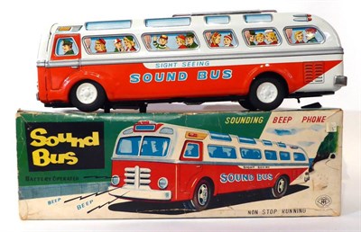 Lot 475 - Modern Toys (Japan) Battery Operated Sound Bus brightly lithographed with passengers in windows...