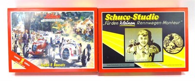 Lot 477 - Schuco Studio II Bausatz Set and Studio Rennwagen Monteur set (both E boxes E) (2)