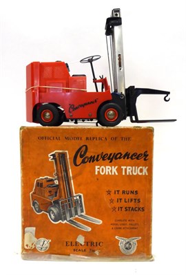 Lot 480 - Victory Models Battery Operated Conveyancer Fork Lift Truck in red plastic with three card...