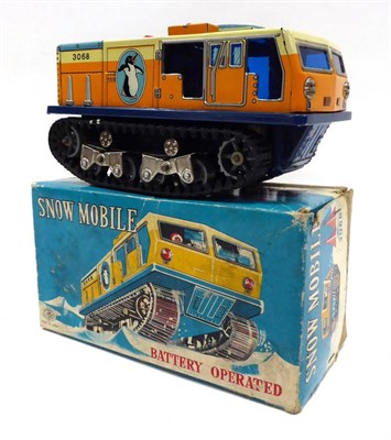 Lot 493 - Modern Toys (Japan) Battery Operated Snow Mobile with twin track with independent suspension 7.5"