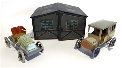 Lot 497 - Bing Garage And Cars consisting of twin door garage (G-F) containing two seat open De Dion...