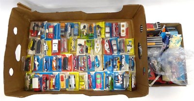 Lot 570A - Matchbox 1-75's And Similar A Collection Of Approximately 50 Models in blister packs (all with...