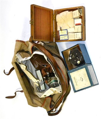 Lot 103 - A Leather Trimmed Canvas Tackle Bag and Contents, comprising a boxed Farlows 4inch 'Python' reel, a