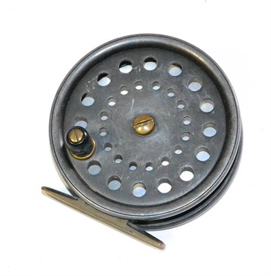 Lot 107 - An Alex Martin 3 1/2inch Alloy 'Caledonia' Fly Reel, with black handle on pierced drum, brass foot