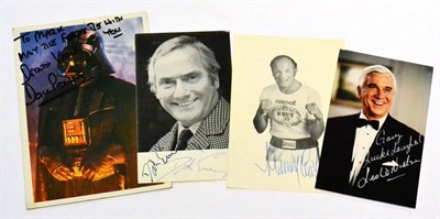 Lot 162 - Four Signed Publicity Photographs Dick Emery, Henry Cooper, Leslie Nielson and David Prowse...