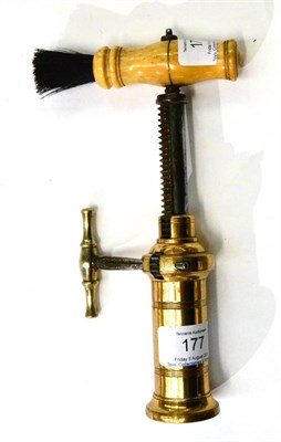 Lot 177 - London Rack Corkscrew with closed brass barrel and bone handle with brush