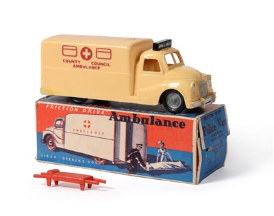 Lot 318 - Mettoy Friction Ambulance With Siren in cream plastic with 'County Council Ambulance' to both sides