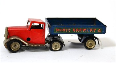 Lot 319 - Minic Brewery Articulated Lorry red cab, silver running boards and blue back (F-G)