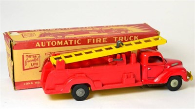 Lot 325 - Walt Reach Automatic Fire Truck friction, with tin cab, plastic back and single piece ladder...