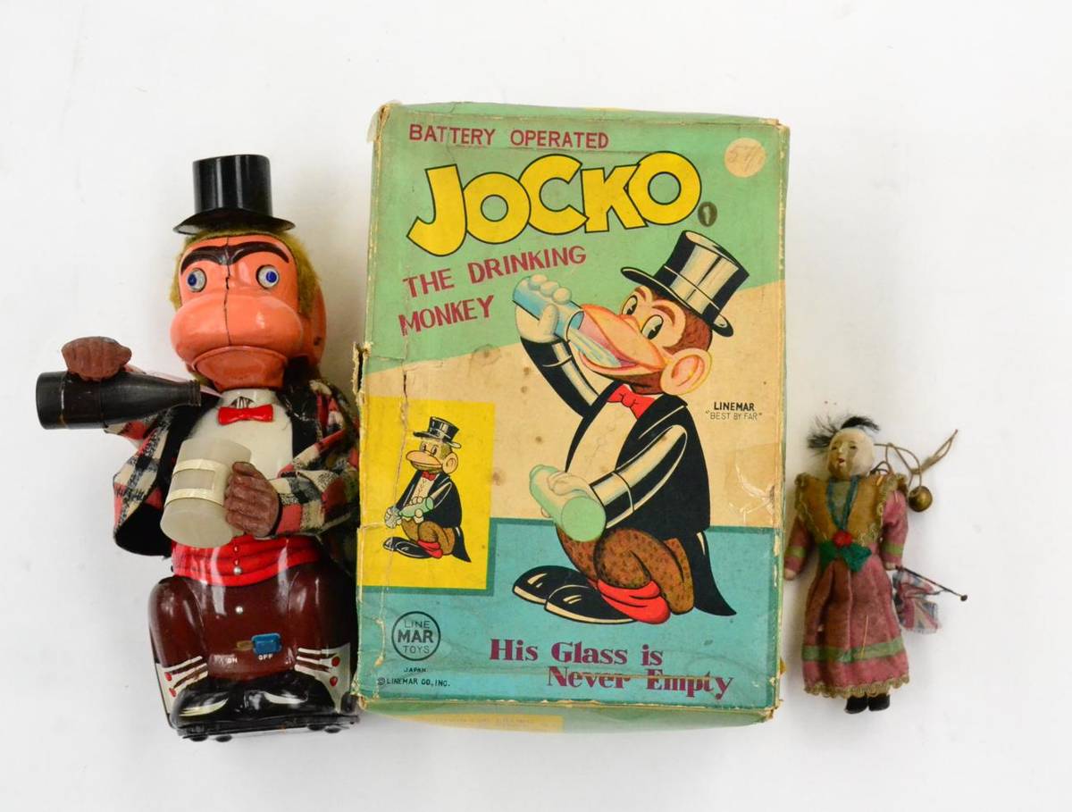 Lot 334 - LineMar (Japan) Battery Operated Jocko The Drinking Monkey (G box F) together with an early...