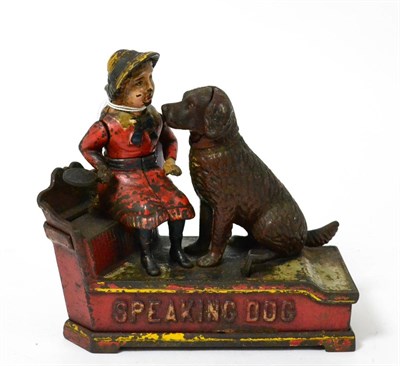 Lot 406 - J & E Stevens Speaking Dog Cast Iron Money Bank with seated girl and dog figures on red base...