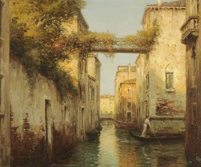 Lot 939 - Antoine Bouvard Snr (1870-1956) Venetian Backwater, with a figure in a gondola Signed, oil on...