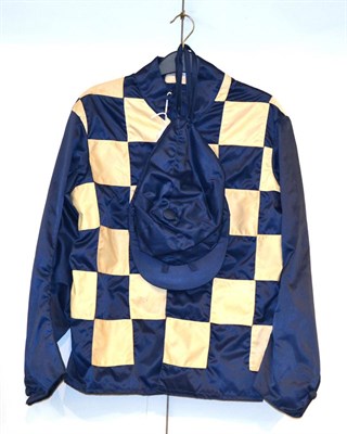 Lot 45 - A Set of Racing Silks, comprising a blue and white checked jacket and a blue cap, made by Frost...