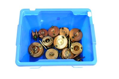 Lot 119 - Twelve Wooden Nottingham Reels, no makers names, with brass star and strap backs, various sizes