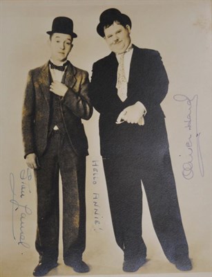 Lot 145 - A Signed Publicity Photograph of Stan Laurel and Oliver Hardy, inscribed 'Hello Annie', 25cm by...