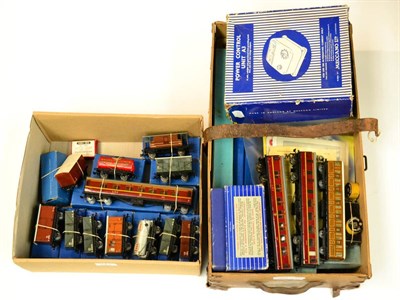 Lot 221 - Hornby Dublo 3-Rail Rolling Stock And Accessories including 2xNE Goods vans, 3xNE Open wagons,...