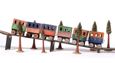 Lot 303 - Ertzgebirge Wooden Train Set consisting of six four wheel coaches with passenger figures, five...