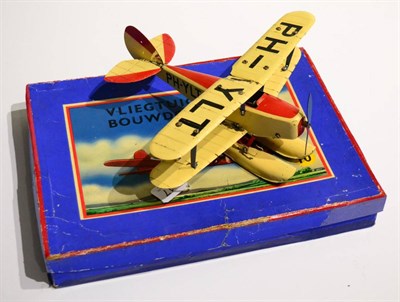 Lot 317 - Meccano No.10 Constructor Aeroplane cream/red biplane, registration PH - YLT, with pilot and floats